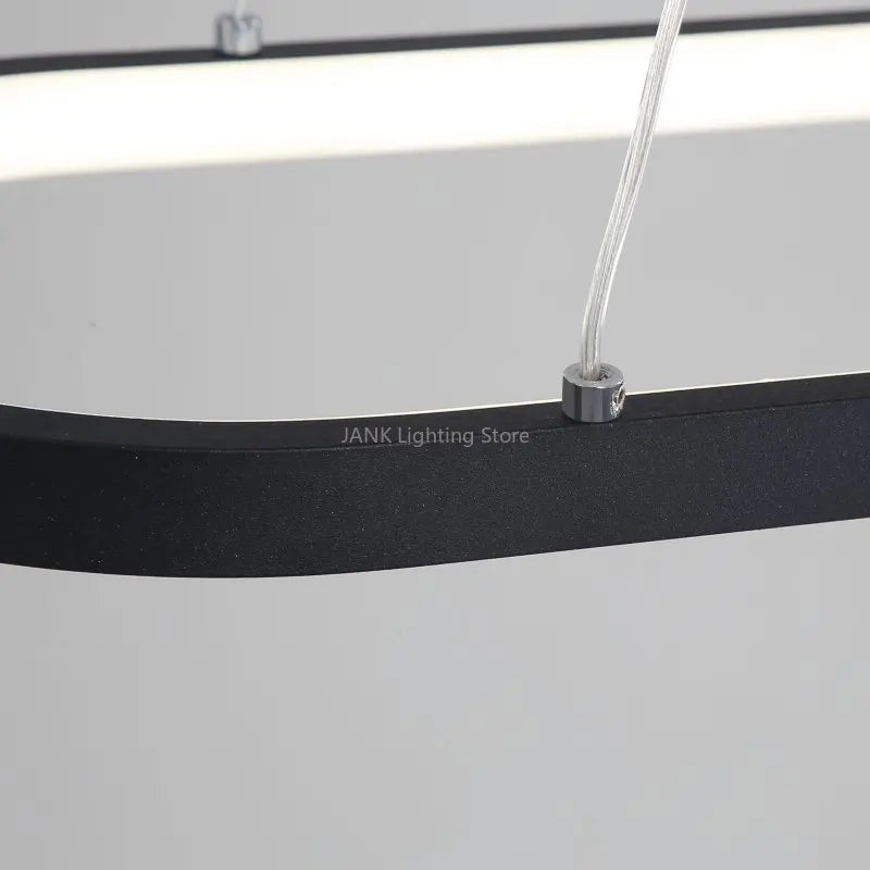 Lámpara colgante LED minimalista con diseño de tira ovalada