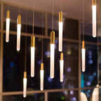 Lámpara colgante minimalista de oro y cobre para escalera