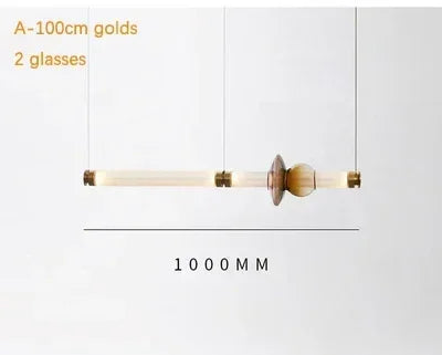 Lámpara colgante de cristal minimalista con detalles de latón