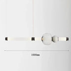Lámpara colgante de cristal minimalista con detalles de latón
