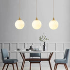 Lámpara colgante nórdica de cristal y latón para comedor