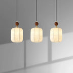 Lámpara colgante textil minimalista con detalle de madera