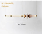 Lámpara colgante de cristal minimalista con detalles de latón