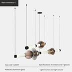 Lámpara colgante de cristal minimalista con detalles de latón