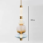 Lámpara colgante de cristal minimalista con detalles de latón