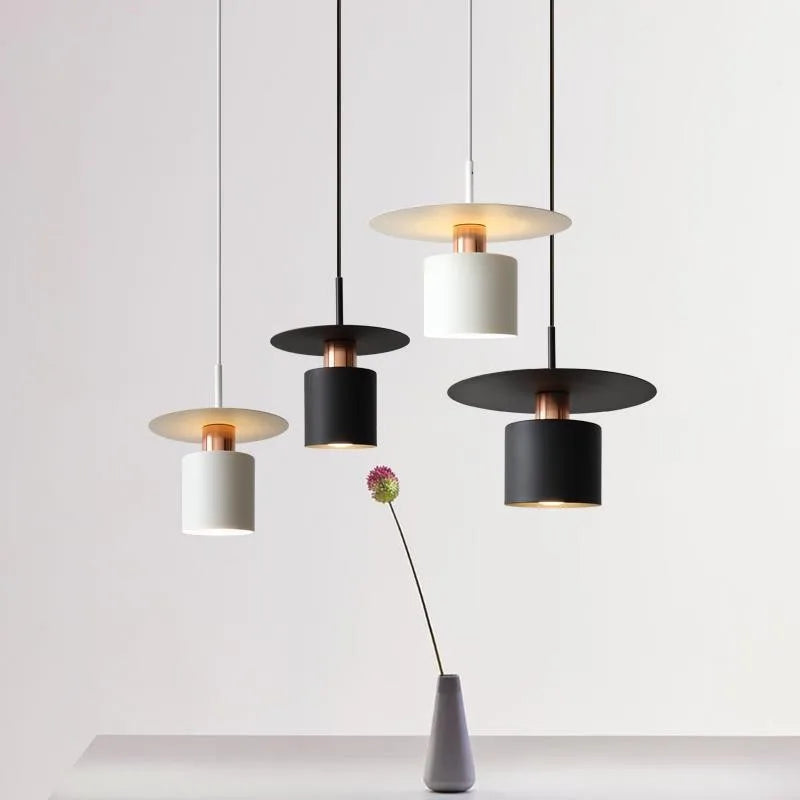 Modern Black Disc and Cylinder Pendant Light with Copper Glow for Bedside